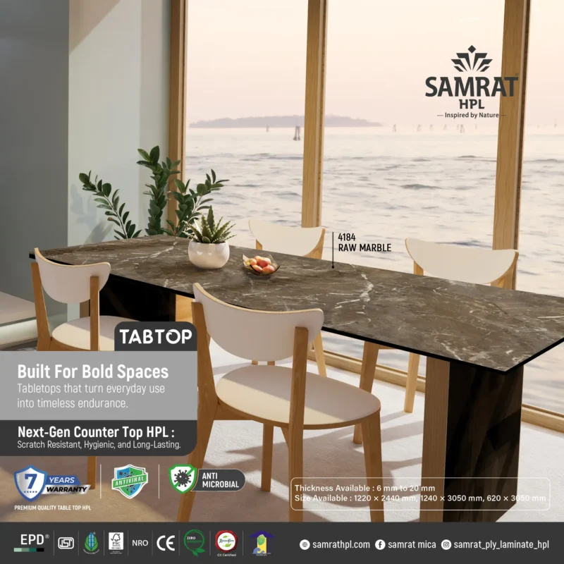 Raw Marble Tabtop HPL dining table beside large windows with a sea view