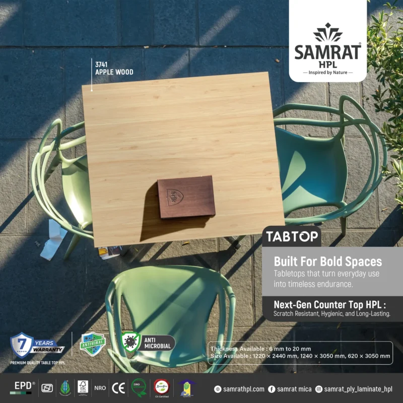 Apple Wood Tabtop HPL square cafe table with green outdoor chairs