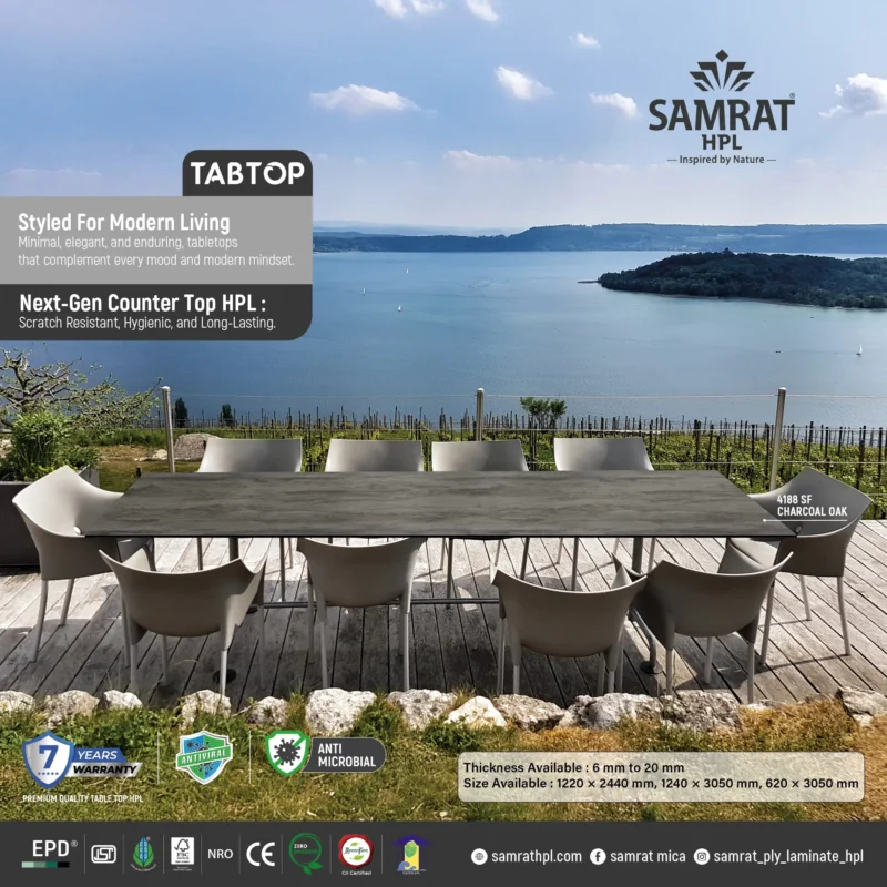 Charcoal Oak Tabtop HPL dining table on an outdoor terrace overlooking a lake