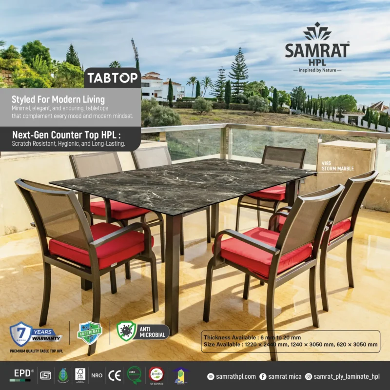 Storm Marble Tabtop HPL outdoor dining table on a terrace with red chairs